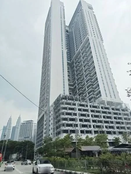 Exterior type: high-rise condominium; features: glass curtain wall, white painted facade, recessed balconies, approximately 30-storey high-rise, surrounded by mature greenery, urban context with city skyline in background; style: modern.
