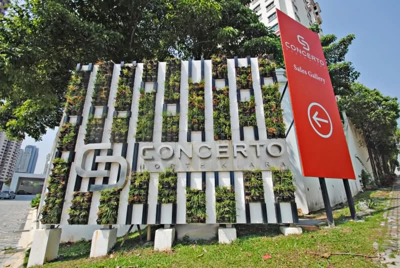 Exterior features: signage with the name 'Concerto', green wall with plants, red directional sign, paved pathway, surrounding greenery, urban context with buildings in the background; style: modern.