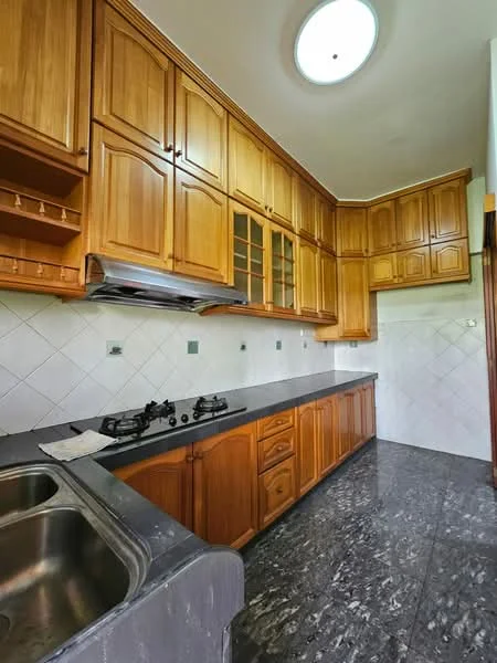 Kitchen features: wood cabinetry with glass-front upper cabinets, black granite countertop, double-bowl stainless-steel sink, chrome pull-down faucet, built-in gas stove with two burners, white tiled backsplash, grey marble flooring, circular ceiling light fixture; style: traditional.