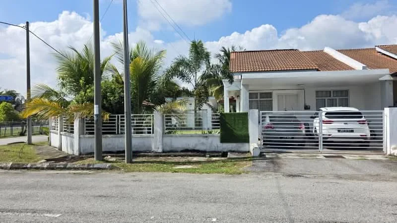 Exterior type: semi-detached house; features: white painted facade, pitched tile roof, manicured lawn, palm trees, fence with horizontal slats, driveway with interlocking pavers, two parked cars, landscaped garden, front porch area; style: modern.