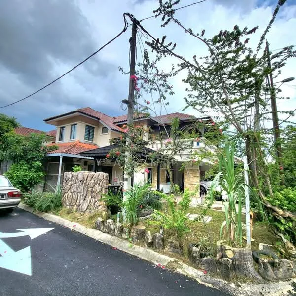 Exterior type: detached bungalow; features: two-storey building, red tiled roof, stone cladding at entrance, manicured garden, mature trees, paved driveway, decorative stone wall, overhead power lines, surrounded by greenery; style: modern.