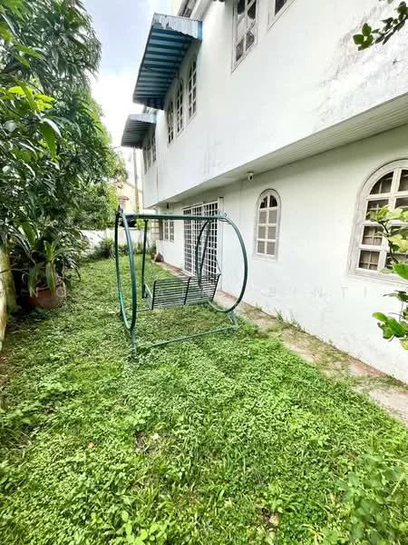 Exterior features: green lawn, swing bench, white painted facade, arched windows, overhanging roof, surrounding greenery.
