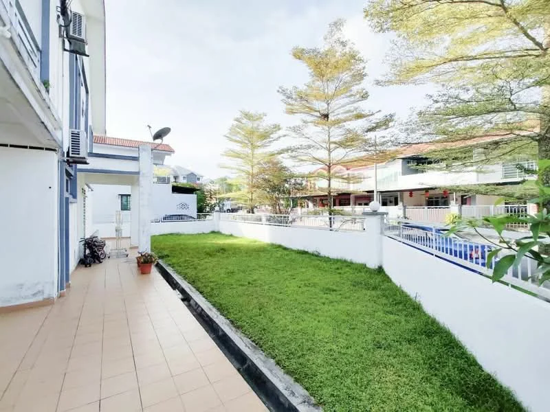 Exterior type: linked terrace house; features: manicured lawn, paved walkway, fenced garden, outdoor lighting, mature trees, covered porch area, bicycle parking, swimming pool visible in background; style: modern.