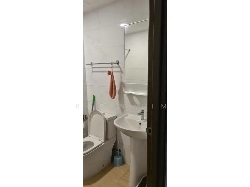 Bathroom features: white tiled walls, light wood flooring, one-piece toilet, single-sink vanity with white cabinet, chrome basin mixer, framed mirror, towel rack, toilet paper holder, cleaning supplies, soap dispenser; style: modern.