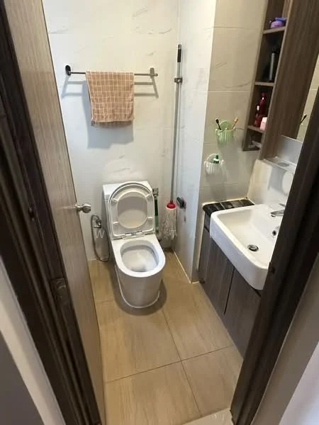 Bathroom features: one-piece toilet, sink with chrome faucet, wood cabinetry, towel rack, mop holder, wall-mounted storage, tile flooring, neutral wall tiles; style: modern.