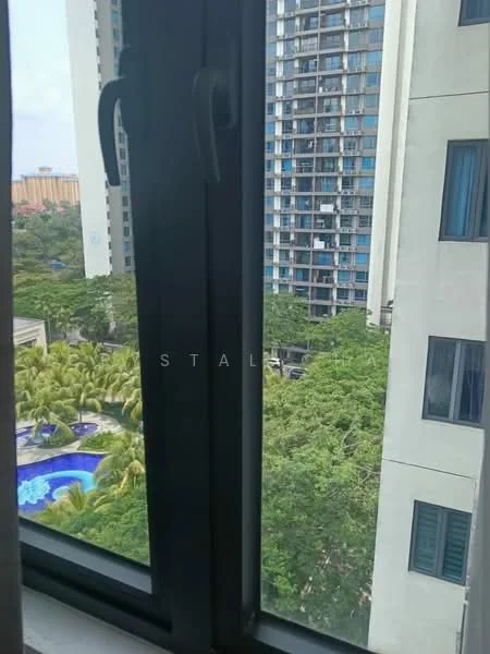 Room features: window with black frame, view of greenery, view of swimming pool, high-rise buildings in background; view: garden.
