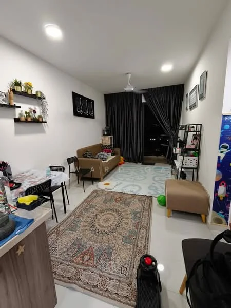 Living features: cream painted walls, white ceiling, 5-blade ceiling fan with light, floor-to-ceiling windows, dark grey curtains, light grey area rug with geometric pattern, 3-seater fabric sofa in brown, wooden coffee table, black metal shelving unit, decorative wall shelves with plants, framed artwork on walls, decorative cushions on sofa, green ball on floor; style: modern; view: city.