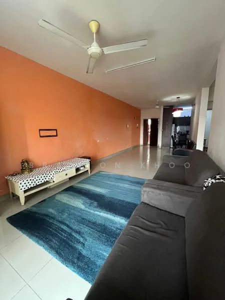 Living features: orange painted walls, white tiled flooring, 5-blade ceiling fan, sofa in dark grey fabric, coffee table, area rug with blue pattern, bench seating against wall, decorative items on bench; style: modern.