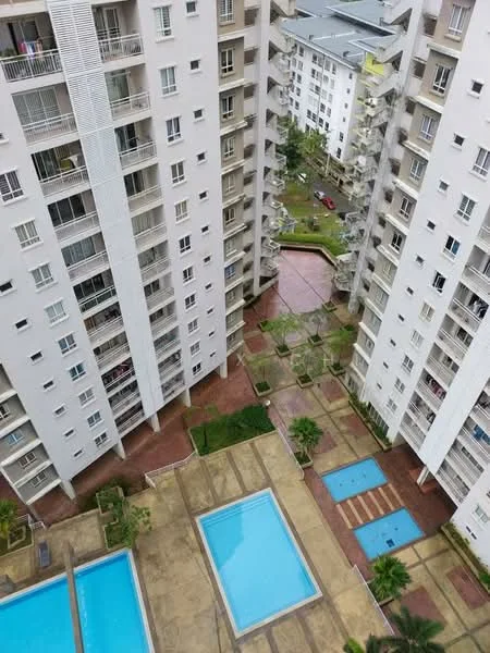 Exterior type: high-rise condominium; features: two swimming pools, landscaped garden area, walkway with interlocking pavers, surrounding greenery, balconies on residential units, multiple storeys, outdoor seating area; style: modern.