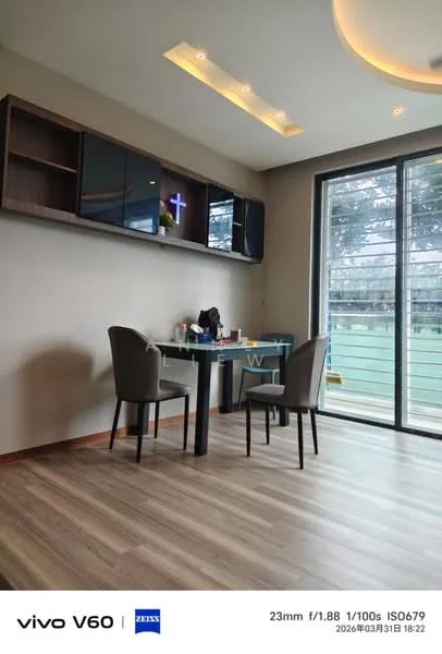 Room features: laminate flooring, light grey painted walls, ceiling with recessed lighting, glass sliding door, window with view to outdoor space, small dining table, two upholstered dining chairs, wall-mounted shelving unit, decorative items on shelf; style: modern; view: garden.