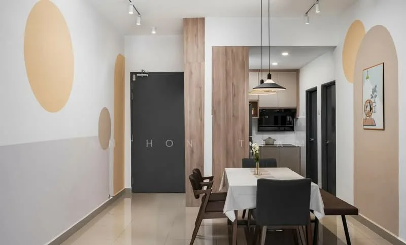 Dining features: dining table with white tablecloth, 4 upholstered dining chairs in grey, pendant light fixture, cream painted walls with circular accents, wood panel accent wall, grey door, kitchen area visible in background, tile flooring, recessed ceiling lights; style: modern.