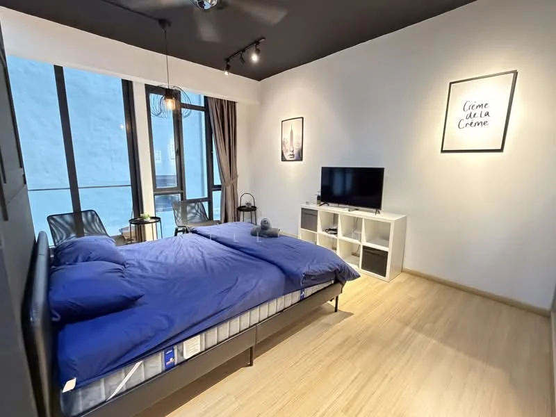 Bedroom features: king-size bed with blue bedding, black metal bed frame, floor-to-ceiling windows, curtains in light brown, wooden flooring, wall-mounted TV, white TV console, decorative wall art, ceiling fan with light, black accent wall, side table with lamp, open shelving unit; style: modern; view: city.