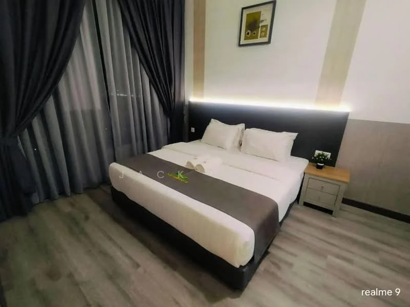 Bedroom features: king-size bed, upholstered headboard, white bedding, grey throw blanket, nightstand with drawer, table lamp, floor-to-ceiling curtains, wood laminate flooring, framed artwork on wall, LED strip lighting behind headboard; style: modern.