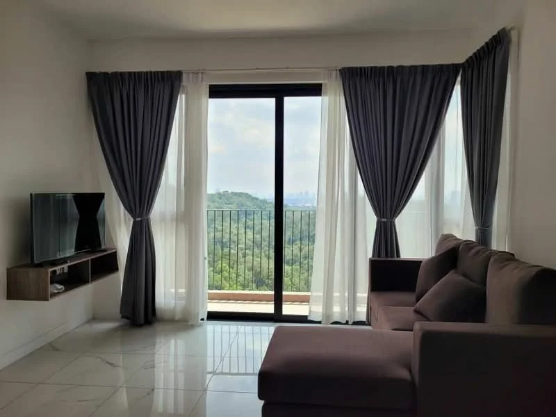 Living features: floor-to-ceiling windows, grey curtains, white sheer curtains, light-coloured walls, marble tile flooring, 3-seater fabric sofa in brown, wall-mounted TV, wooden TV console, open view of greenery, balcony access; style: modern; view: garden.