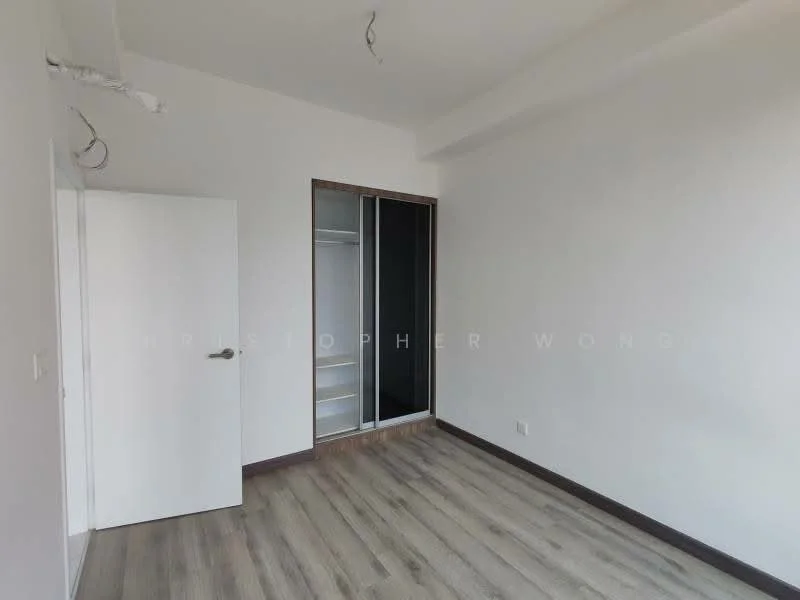 Room features: white painted walls, laminate flooring, built-in wardrobe with sliding doors, ceiling with exposed beams, single door, window with no visible treatment.