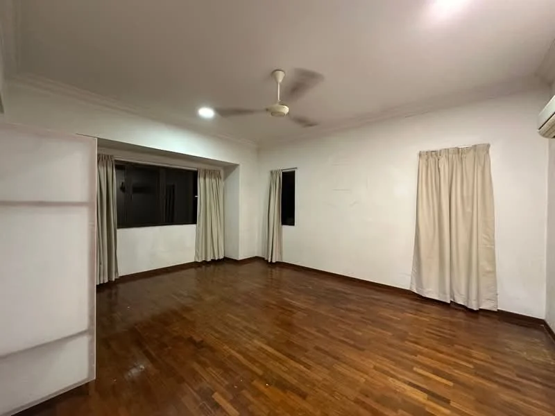 Room features: wooden flooring, white painted walls, ceiling fan, two windows, curtains on windows, air conditioning unit, no visible furniture.
