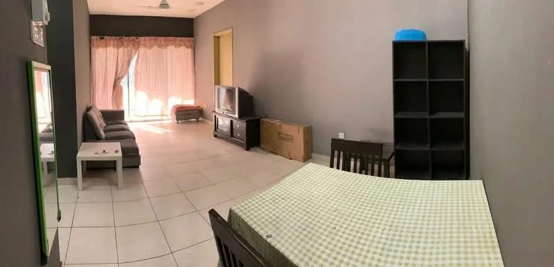 Living features: grey painted walls, white tiled flooring, 5-blade ceiling fan, sofa in dark grey, coffee table, TV console, wall-mounted TV, large windows with sheer curtains, dining table with checkered tablecloth, black shelving unit, cardboard box, natural light from windows; style: modern.