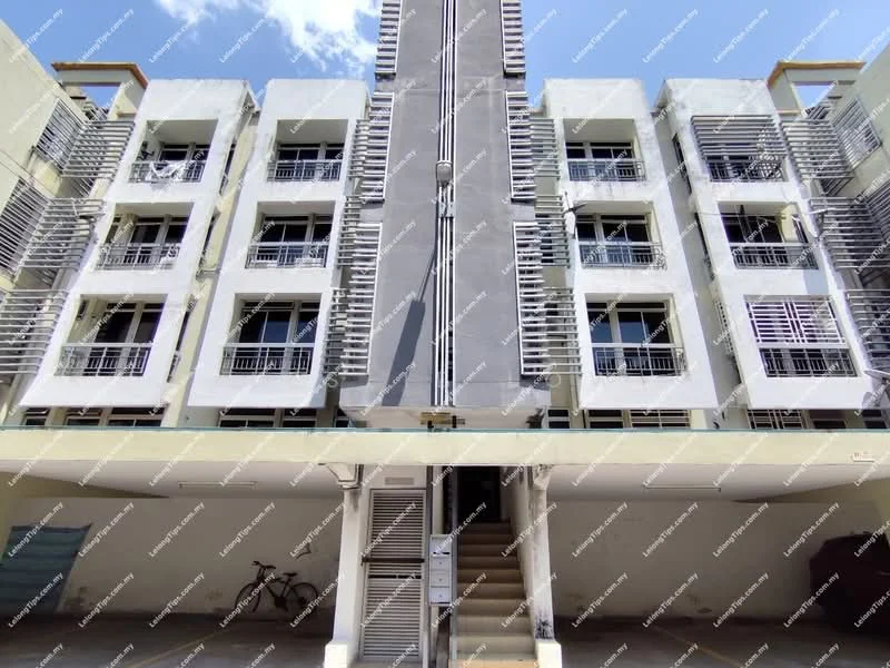 Exterior type: low-rise apartment block; features: grey painted facade, balconies with metal railings, staircase leading to entrance, bicycle parked at the entrance, multiple windows with louvre screens, ground-level parking area, two-storey building, concrete structure; style: modern.