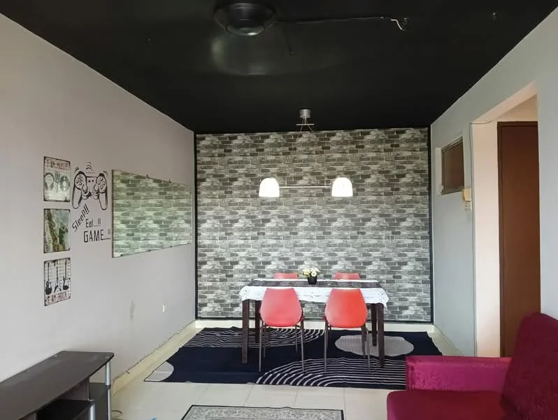 Dining features: black ceiling, grey accent wall with stone pattern, white dining table, 4 red dining chairs, decorative mirror on wall, wall art with illustrations, area rug with geometric pattern, light fixture with two pendant lamps, wooden flooring, sliding door to adjacent room; style: modern.