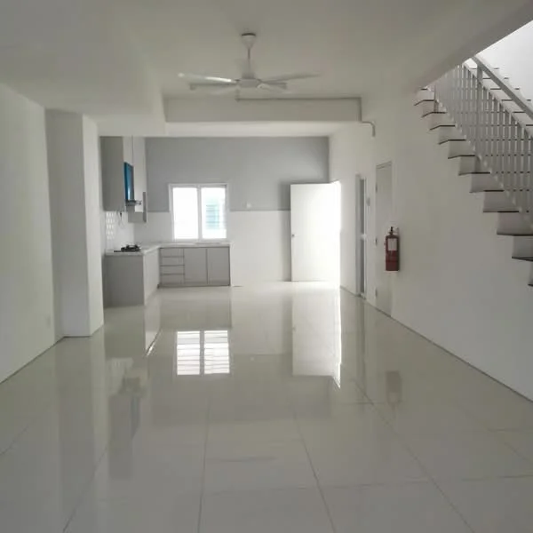 Living features: white painted walls, polished tile flooring, 5-blade ceiling fan, large windows, open layout, staircase with metal railing, door leading to another room, fire extinguisher mounted on wall; style: modern. Kitchen features: grey cabinetry, white tiled backsplash, stainless-steel sink, built-in countertop, open layout to living area; style: modern.