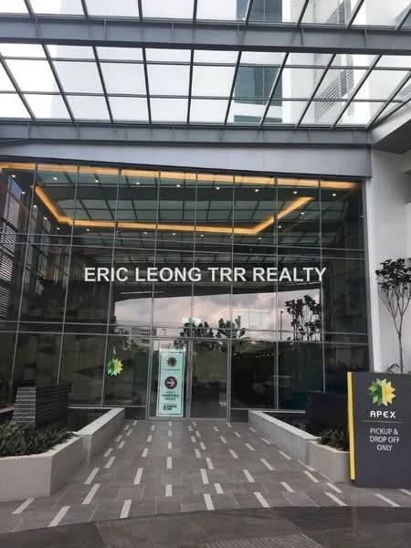 Exterior type: commercial building; features: glass facade, double-volume entrance, canopy roof, paved walkway, landscaped planters, signage at entrance, modern architectural design; style: modern.