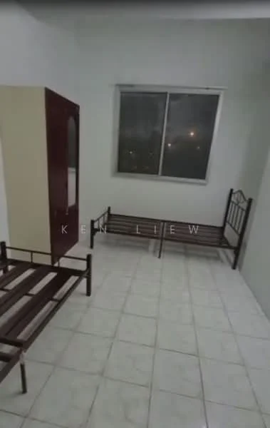 Room features: white painted walls, tile flooring, single window, two metal bed frames, wardrobe with mirror, neutral color scheme.