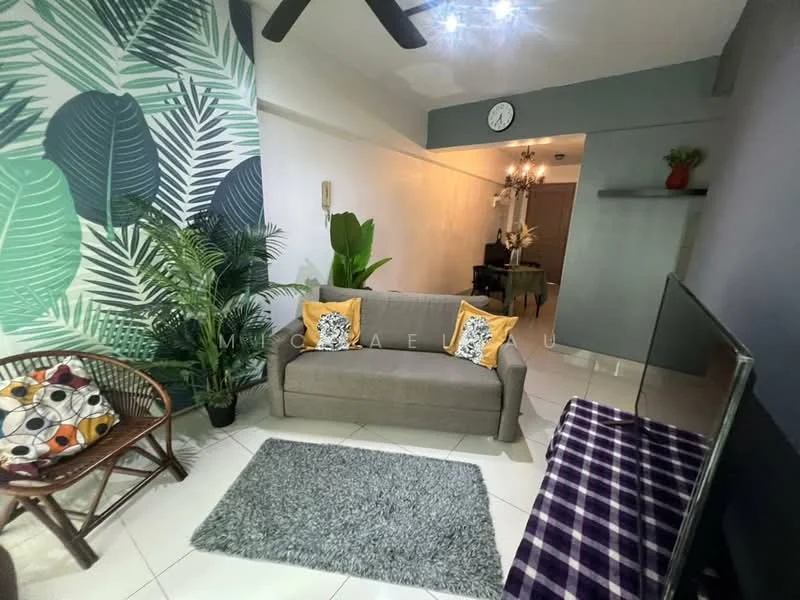 Living features: grey fabric sofa, decorative throw pillows, area rug with geometric pattern, wall-mounted TV, wooden coffee table, ceiling fan with light, green accent wall with leaf pattern, potted plants, wall clock, white tiled flooring, shelving unit, decorative wall shelf; style: modern.