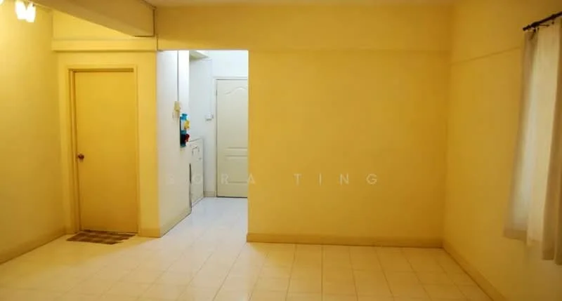 Room features: cream painted walls, white tiled flooring, door with simple panel design, window with sheer curtains, light fixture on ceiling, laundry area visible in background, neutral color scheme.