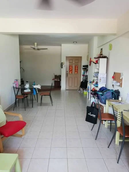 Living features: tiled flooring, white painted walls, ceiling fan, dining table with chairs, wooden armchair, open layout, decorative wall clock, wall-mounted bulletin board, various bags and items on the floor.