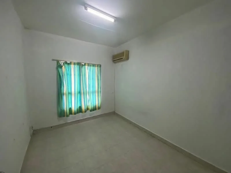 Room features: white painted walls, light-colored tile flooring, window with sheer curtains, air conditioning unit, ceiling lights.