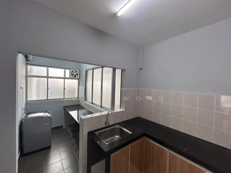 Kitchen features: grey painted walls, black countertop, wood cabinetry, single-bowl stainless-steel sink, chrome pull-down faucet, ceramic tile flooring, window with frosted glass, laundry area with washing machine, open layout to adjacent room; style: modern.