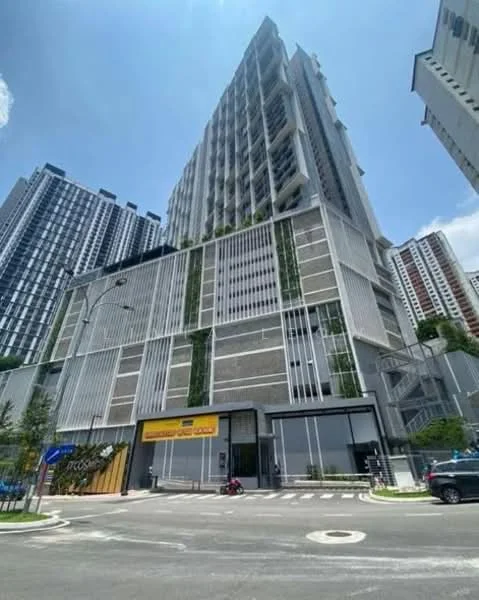 Exterior type: high-rise condominium; features: glass curtain wall, exposed concrete facade, vertical fins, recessed balconies, greenery on facade, multiple storeys, commercial space at ground level, surrounded by urban environment; style: modern.