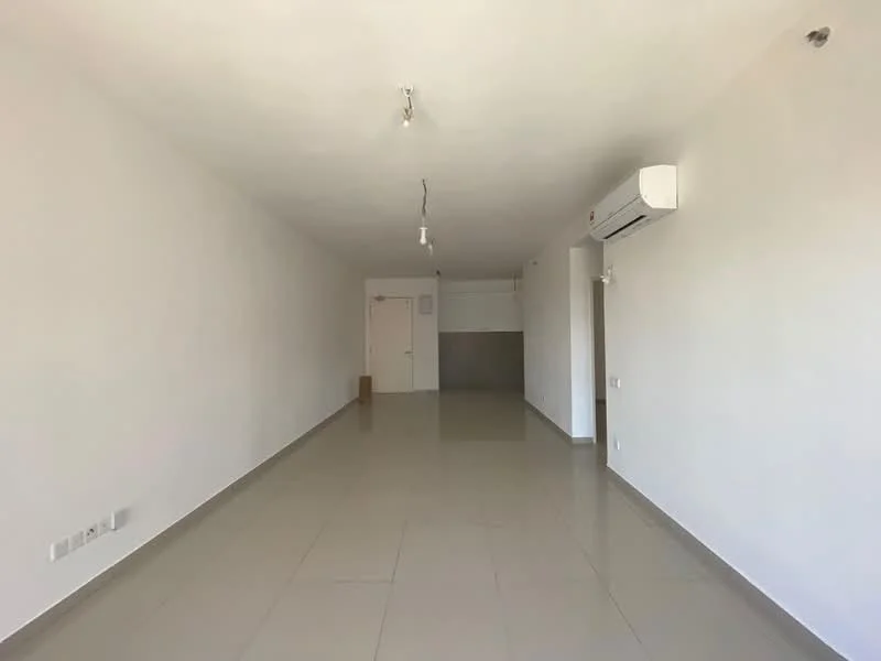 Room features: white painted walls, polished ceramic tile flooring, recessed downlights, 1 wall-mounted split AC, open space layout, no visible furniture, neutral color scheme, single door entrance, grey accent wall in background; style: modern.