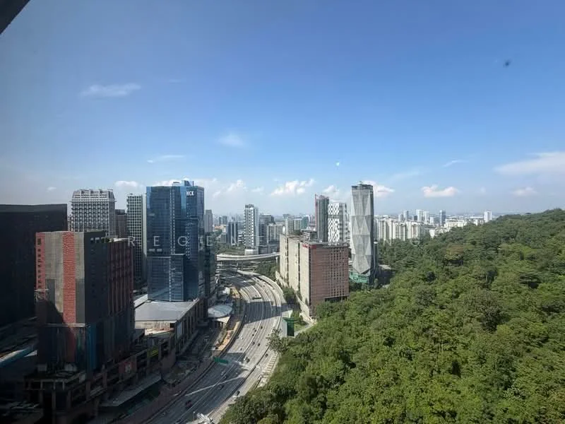 Exterior type: high-rise condominium; features: city skyline view, surrounded by greenery, urban landscape, high-rise buildings, main road visible, clear blue sky; style: modern.