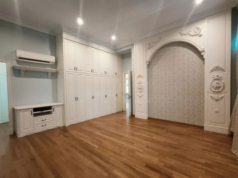 Bedroom features: wooden flooring, white painted walls, decorative wall with floral pattern, built-in wardrobe with multiple doors, wall-mounted air conditioning unit, ceiling with recessed lighting, curtains, decorative archway; style: traditional.