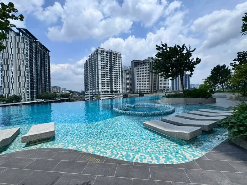 Exterior type: high-rise condominium; features: infinity pool, pool deck with loungers, tiled pool surface, landscaped garden area, surrounding high-rise buildings, skyline view, jacuzzi area, stone-paved walkway; style: modern.