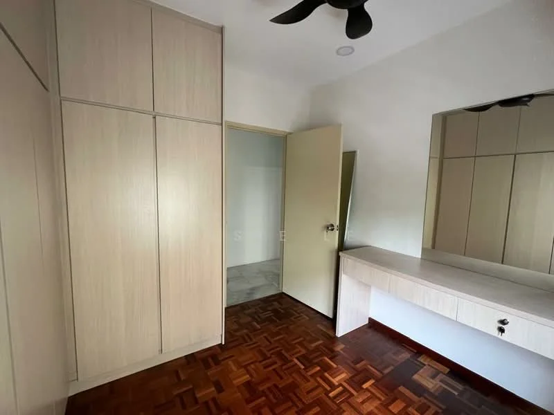 Bedroom features: built-in wardrobe with sliding doors, wooden flooring, ceiling fan, mirror above the dresser, neutral wall color, door leading to another room, natural light from door, decorative wall paneling; style: modern.