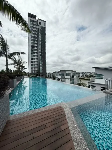 Exterior type: high-rise condominium; features: infinity pool, pool deck with loungers, tiled pool surface, surrounded by palm trees, concrete pool edge, view of high-rise building, landscaped garden area, cloudy sky, modern architectural design; style: modern.