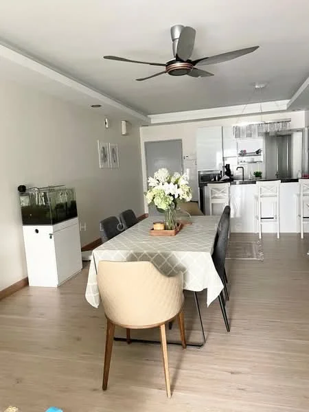 Dining features: 6-seater dining table, upholstered dining chairs, ceiling fan with light, light wood flooring, white walls, decorative vase with flowers, open-plan layout to kitchen, sideboard, kitchen visible in background; style: modern.