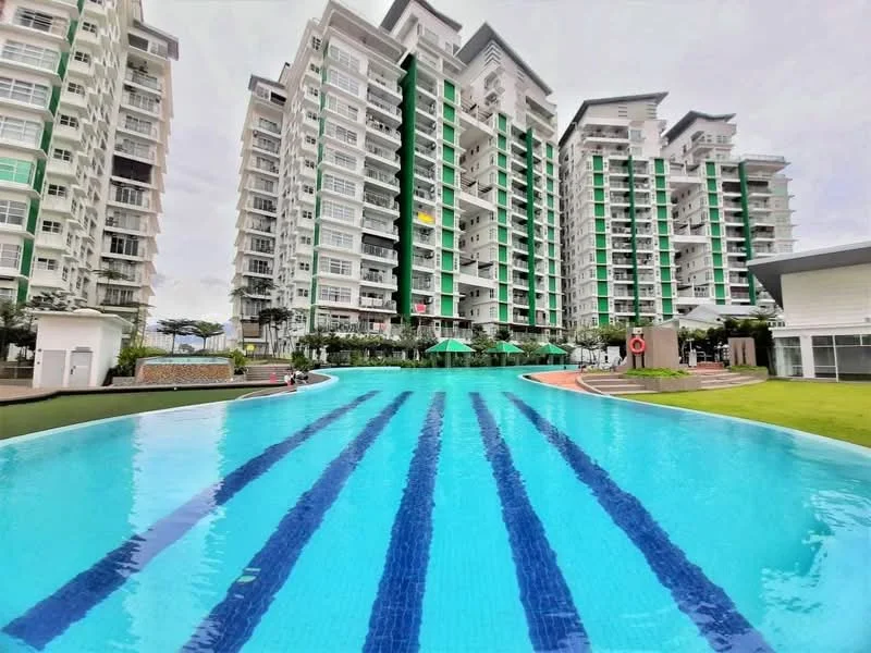 Exterior type: high-rise condominium; features: infinity pool with lap lanes, surrounding landscaped garden, multiple high-rise buildings, green accents on facade, pool deck with loungers, children's playground, outdoor dining area, manicured lawn, water feature, security guard house, CCTV cameras visible; style: modern.