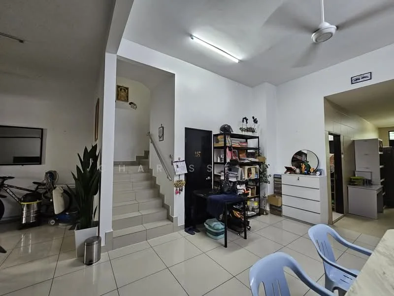 Room features: white painted walls, tile flooring, staircase with light-colored steps, ceiling with recessed lighting, 5-blade ceiling fan, open shelving unit, black door, decorative wall art, bicycle visible, indoor plant, storage cabinet, dining chairs; style: modern.