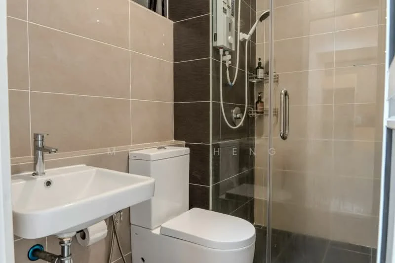Bathroom features: single-sink vanity with chrome faucet, white ceramic sink, one-piece toilet, walk-in shower with glass enclosure, rain shower head, handheld shower, tile cladding on walls, light grey tile flooring, wall-mounted shower controls, mirror above sink; style: modern.