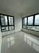 Room features: white painted walls, glossy tile flooring, floor-to-ceiling windows, city view, natural light, corner room, neutral color scheme, minimalist design; style: modern; view: city.