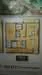 Floor plan: 2-bedroom 2-bathroom unit; features: open-plan kitchen-dining-living, master bedroom with ensuite bathroom, bedroom 2 with shared bathroom, balcony off living room, utility room, laundry area, central foyer, 1 car porch.