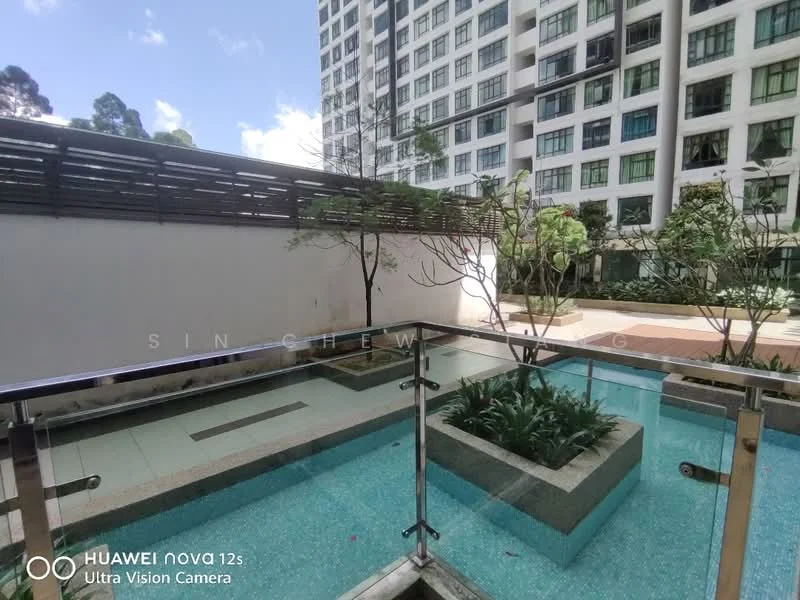 Exterior type: mid-rise condominium; features: glass railing, water feature with plants, manicured landscaping, paved walkway, surrounding greenery, modern facade, balcony view, outdoor space; style: modern.