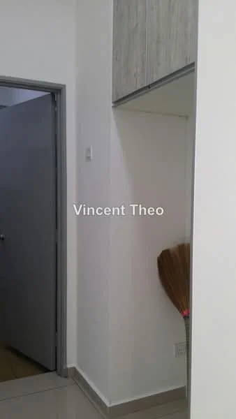 Room features: white painted walls, light-colored flooring, grey door, broom in corner, built-in storage above, minimalist decor; style: modern.
