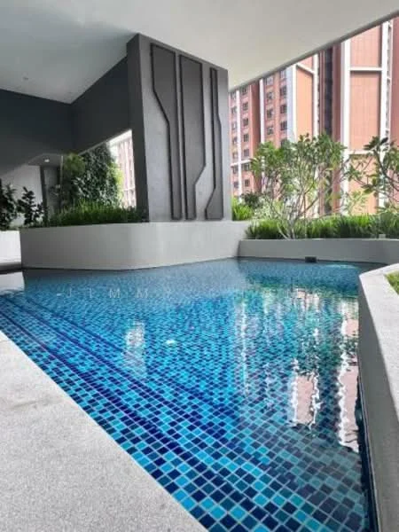 Exterior type: swimming pool deck; features: infinity edge pool, mosaic tile pool surface, surrounded by greenery, concrete deck, modern architectural elements, partially shaded area; style: modern.
