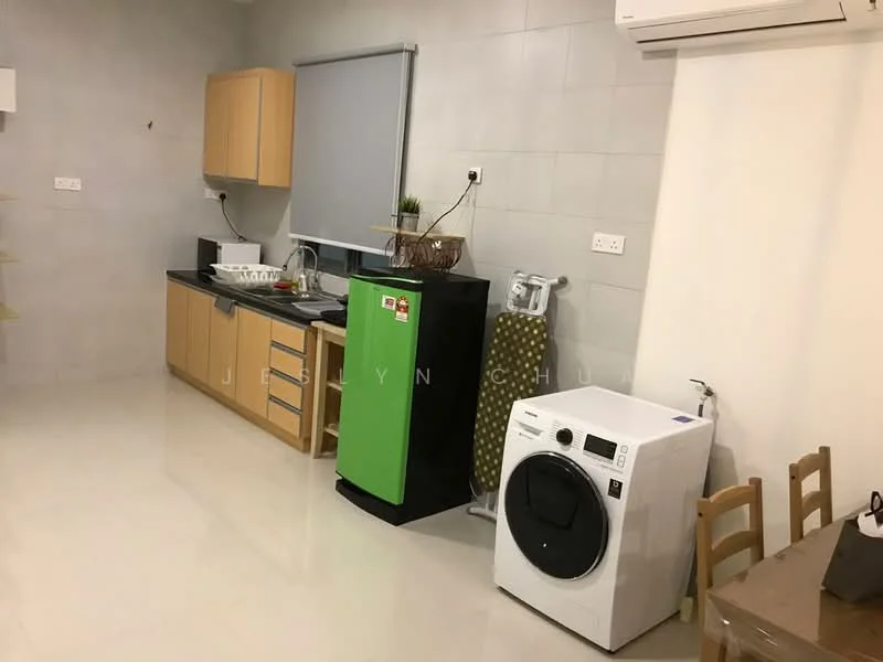 Kitchen features: light grey tiled walls, white glossy floor tiles, wooden cabinetry in light brown, black countertop, single-bowl stainless-steel sink, chrome pull-down faucet, green refrigerator, built-in washing machine, ironing board, wall-mounted air conditioning unit, open shelving, small dining table with chairs; style: modern.