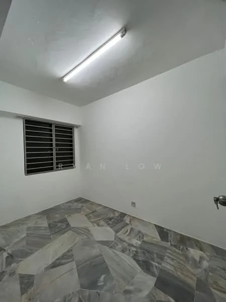 Room features: white painted walls, marble tile flooring, window with horizontal metal grilles, fluorescent ceiling lights.