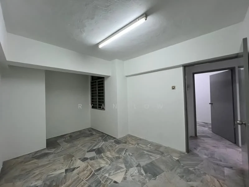 Room features: white painted walls, marble flooring, fluorescent ceiling light, window with metal grille, doorway leading to another room, neutral color scheme; style: minimalist.